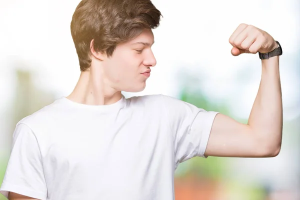 Junger Gutaussehender Mann Lässigem Weißem Shirt Über Isoliertem Hintergrund Starke — Stockfoto