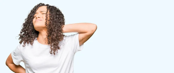 Young Beautiful Woman Curly Hair Wearing White Shirt Suffering Neck — Stock Photo, Image