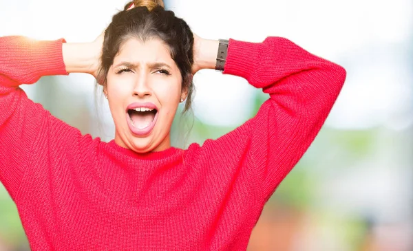 Young Beautiful Woman Wearing Red Sweater Bun Crazy Scared Hands — Stock Photo, Image