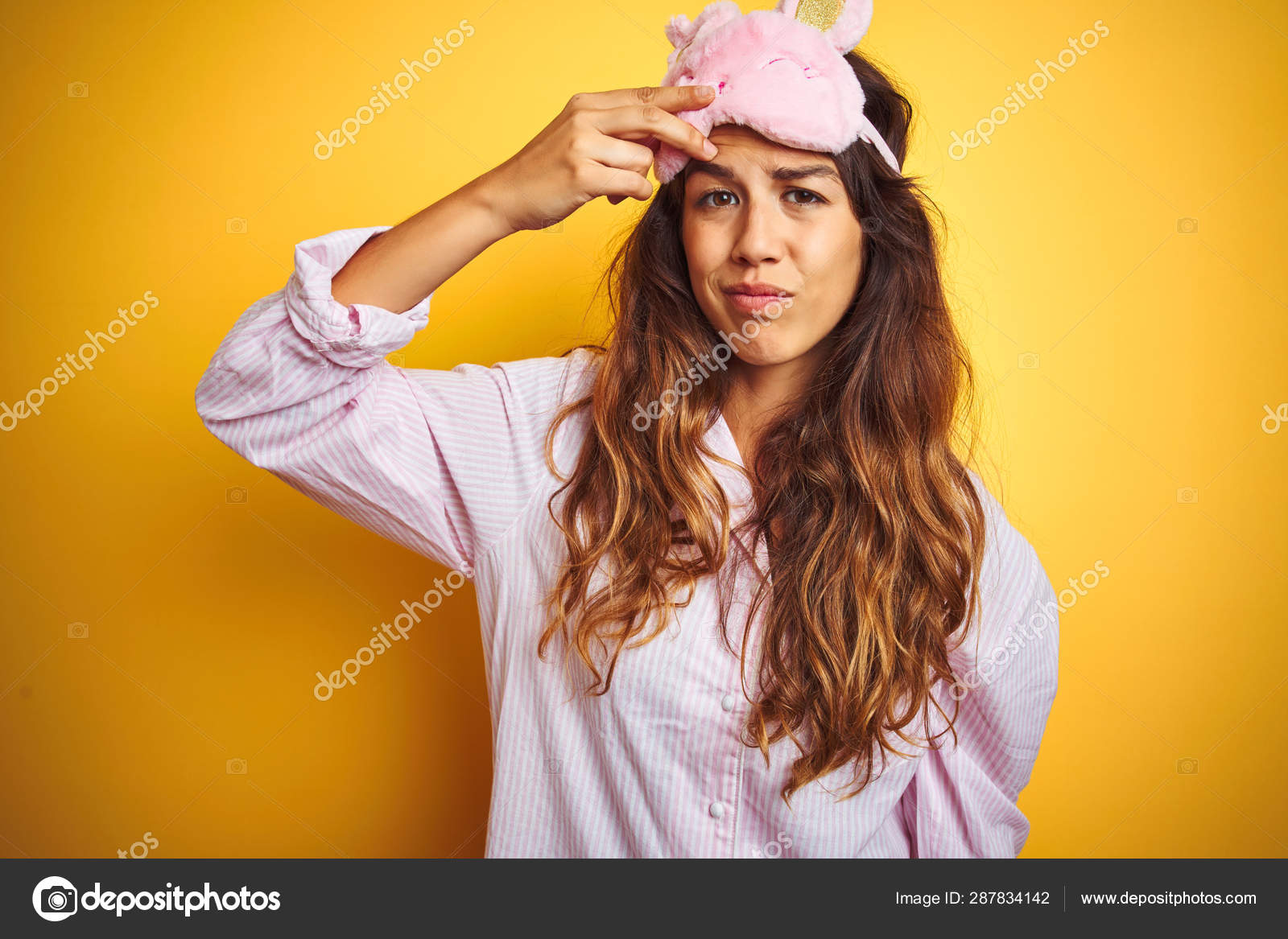 Young Woman Wearing Pajama Sleep Mask Standing Yellow Isolated