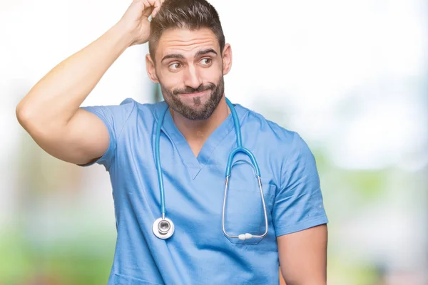 Handsome Young Doctor Surgeon Man Isolated Background Confuse Wonder Question — Stock Photo, Image
