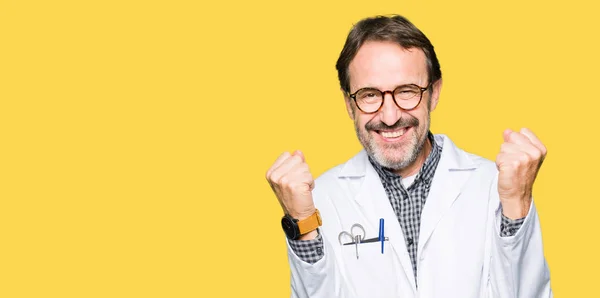 Middle Age Doctor Men Wearing Medical Coat Celebrating Surprised Amazed — Stock Photo, Image