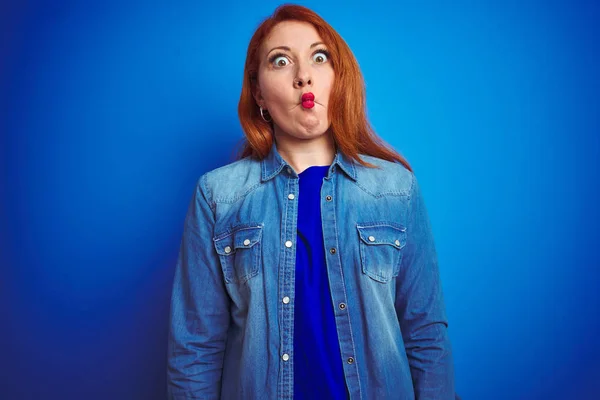 Young Beautiful Redhead Woman Wearing Denim Shirt Standing Blue Isolated — Stock Photo, Image