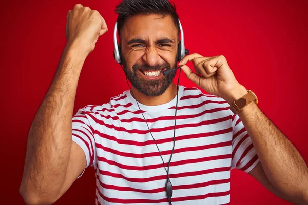 Young Indian Call Center Agent Man Using Headset Isolated Red — Stock Photo, Image