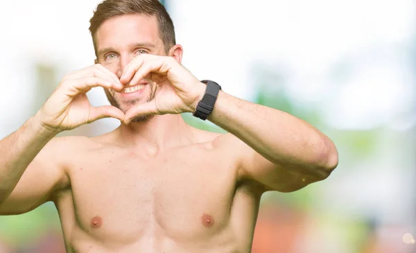 Handsome Shirtless Man Showing Nude Chest Smiling Love Showing Heart — Stock Photo, Image