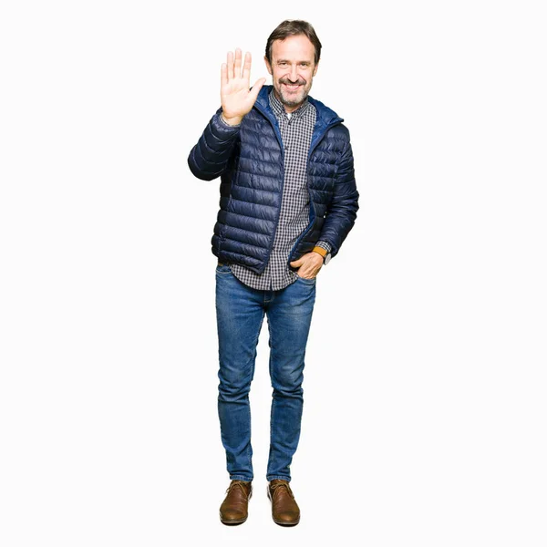 Middle Age Handsome Man Wearing Winter Coat Waiving Saying Hello — Stock Photo, Image