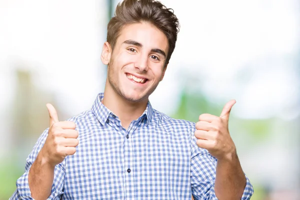 Joven Hombre Negocios Guapo Sobre Signo Éxito Fondo Aislado Haciendo —  Fotos de Stock