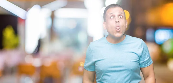 Hombre Árabe Mediana Edad Con Camiseta Azul Sobre Fondo Aislado —  Fotos de Stock