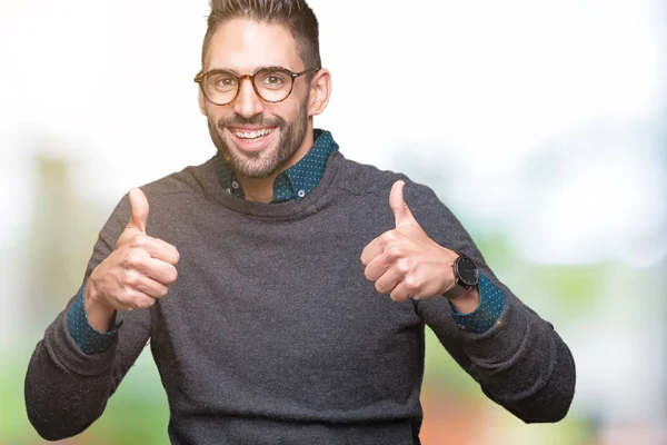 Joven Hombre Guapo Con Gafas Sobre Signo Éxito Fondo Aislado —  Fotos de Stock