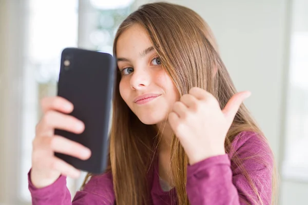 Beautiful Young Girl Kid Sending Message Using Smartphone Pointing Showing — Stock Photo, Image