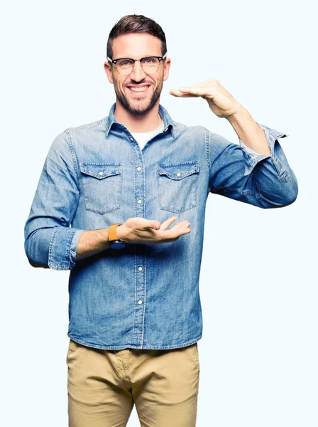 Handsome Man Wearing Glasses Gesturing Hands Showing Big Large Size — Stock Photo, Image