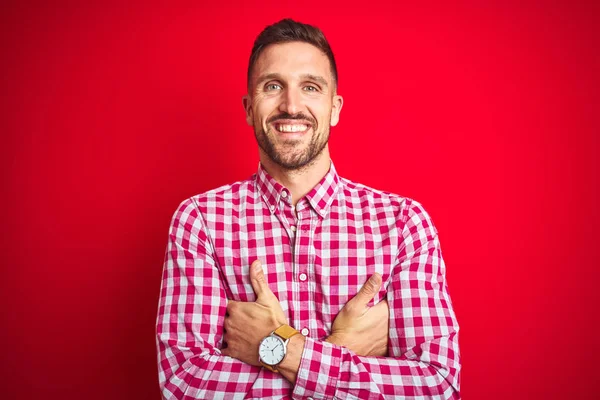 Young Handsome Man Red Isolated Background Happy Face Smiling Crossed — Stock Photo, Image