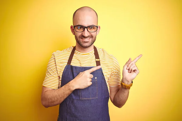 Young Bartender Man Wearing Barista Apron Working Professional Yellow Background — Stock Photo, Image