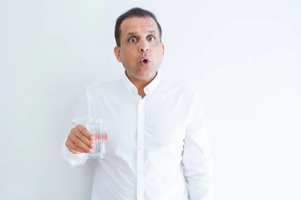 Middle Age Man Drinking Glass Water White Background Scared Shock — Stock Photo, Image