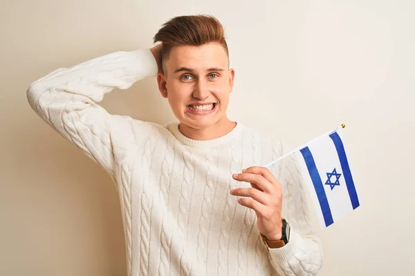 Młody Przystojny Mężczyzna Trzyma Izrael Izraelską Flagę Białym Tle Podkreślił — Zdjęcie stockowe