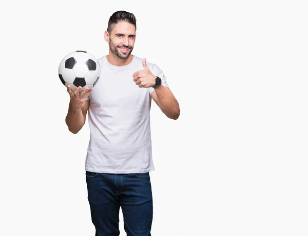 Joven Sosteniendo Pelota Fútbol Sobre Fondo Aislado Feliz Con Una —  Fotos de Stock