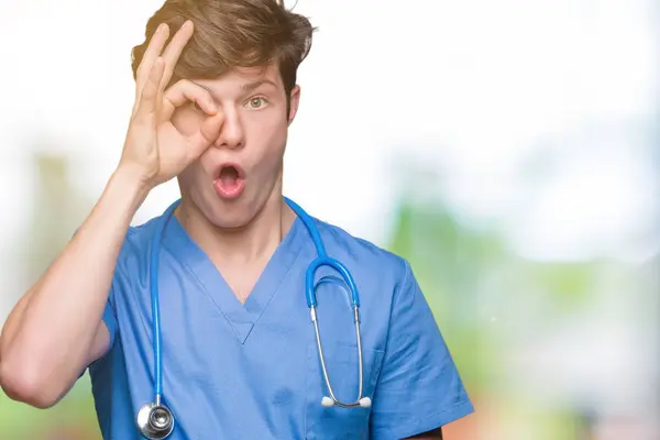 Young Doctor Wearing Medical Uniform Isolated Background Doing Gesture Shocked — Stock Photo, Image