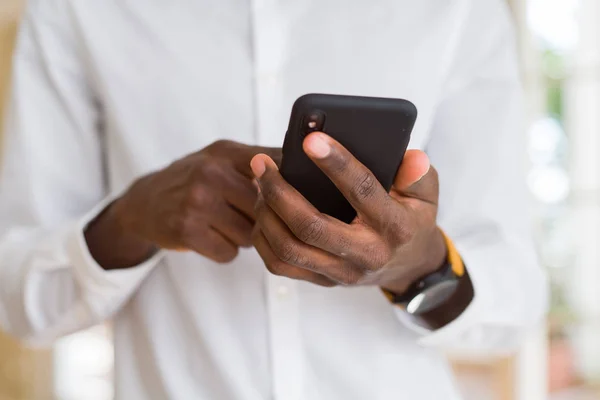 Close African Man Hands Using Smarpthone — Stock Photo, Image