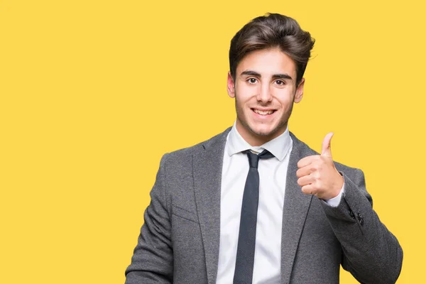 Joven Hombre Negocios Vistiendo Traje Corbata Sobre Fondo Aislado Haciendo —  Fotos de Stock