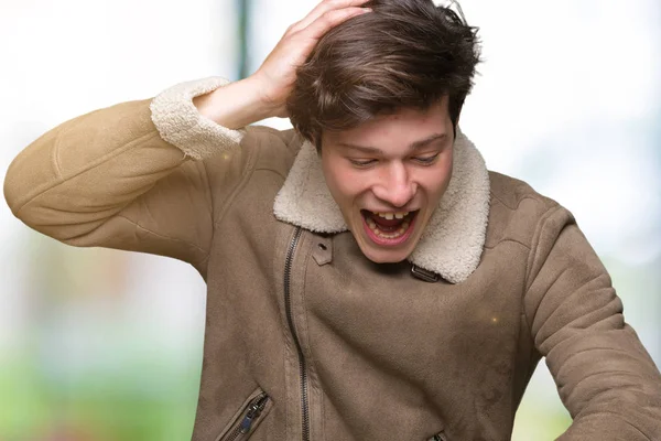 Joven Hombre Guapo Con Abrigo Invierno Sobre Fondo Aislado Mirando — Foto de Stock