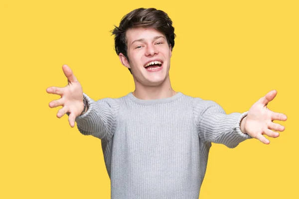 Homem Bonito Jovem Vestindo Camisola Inverno Sobre Fundo Isolado Olhando — Fotografia de Stock