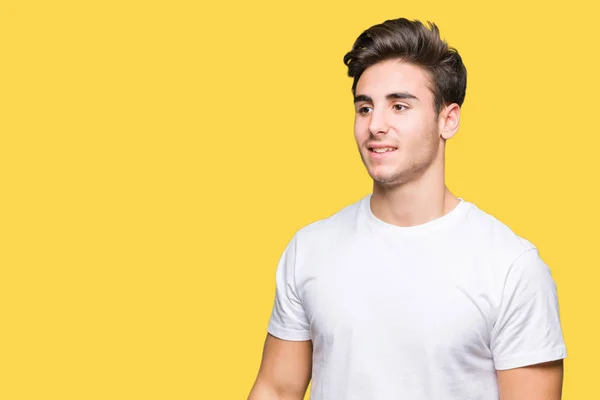 Homem Bonito Jovem Vestindo Shirt Branca Sobre Fundo Isolado Olhando — Fotografia de Stock