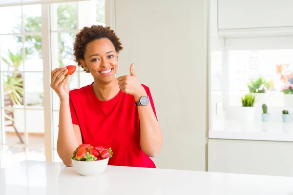 Young African American Woman Eating Fresh Strawberries Breakfast Happy Big — Stock Photo, Image