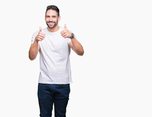 Hombre Joven Con Camiseta Blanca Casual Sobre Signo Éxito Fondo —  Fotos de Stock