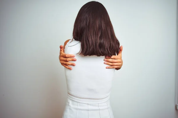 Young Beautiful Woman Wearing Dress Standing White Isolated Background Hugging — Stock Photo, Image