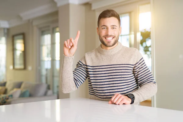 Jonge Knappe Man Thuis Tonen Wijzend Met Vinger Nummer Een — Stockfoto