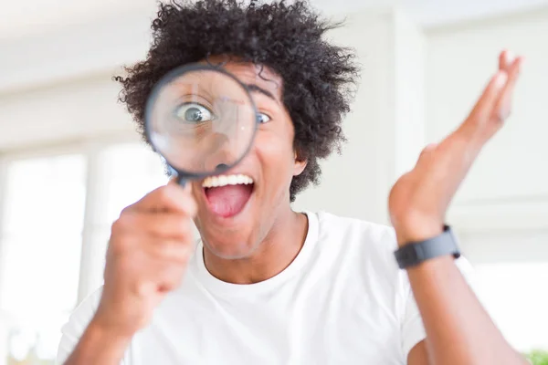 African American Man Looking Magnifying Glass Very Happy Excited Winner — Stock Photo, Image