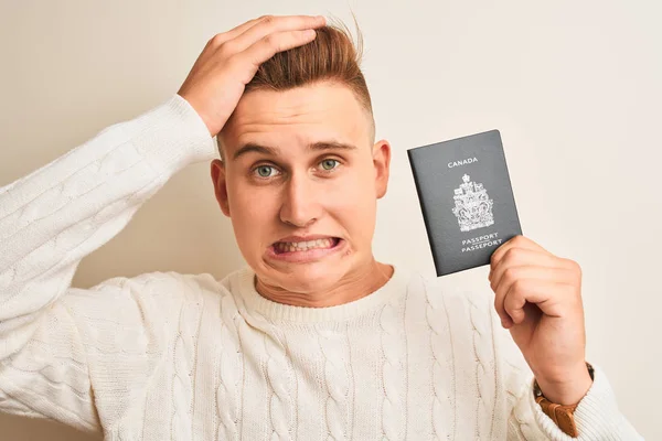 Joven Hombre Guapo Con Pasaporte Canadiense Sobre Fondo Blanco Aislado —  Fotos de Stock