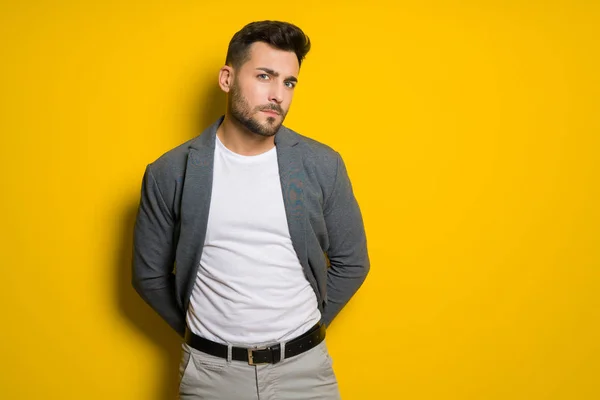 Young Handsome Man Possing Modeling Yellow Isolated Background — Stock Photo, Image