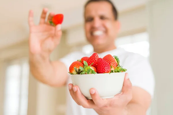 Middle Age Man Eating Straweberry Home — Stock Photo, Image