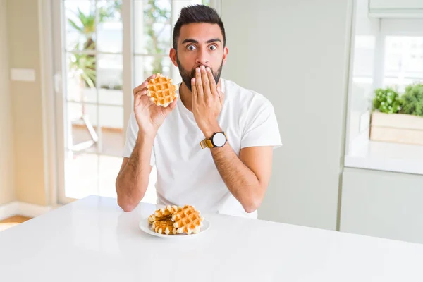 Handsome Hispanic Man Eating Sweet Belgian Waffle Pastry Cover Mouth — Stock Photo, Image