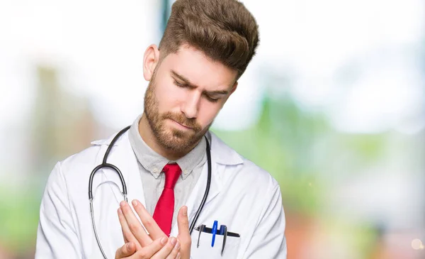 Young Handsome Doctor Man Wearing Medical Coat Suffering Pain Hands — Stock Photo, Image