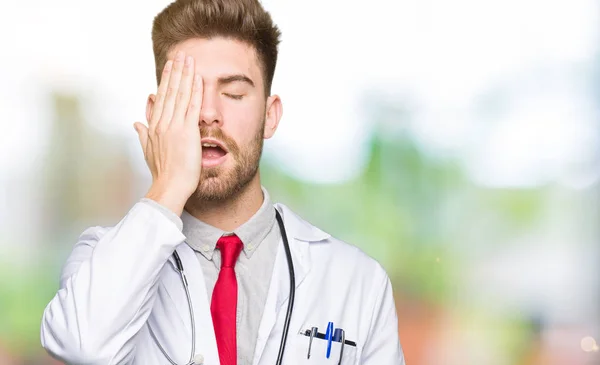 Young Handsome Doctor Man Wearing Medical Coat Yawning Tired Covering — Stock Photo, Image