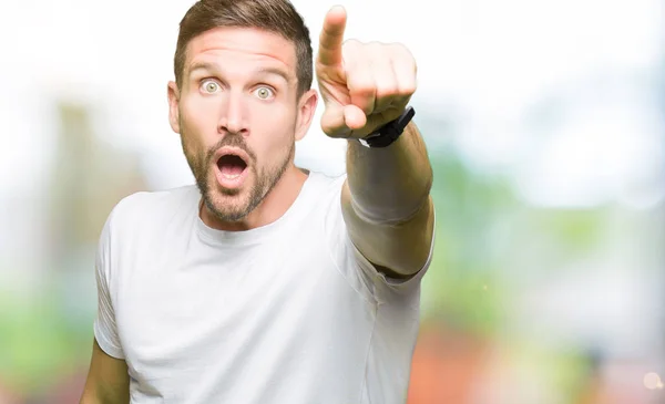 Handsome Man Wearing Casual White Shirt Pointing Finger Surprised Ahead — Stock Photo, Image