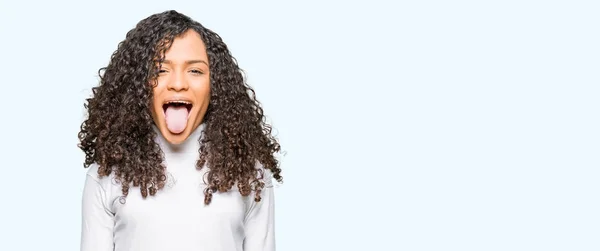 Young Beautiful Woman Curly Hair Wearing Turtleneck Sweater Sticking Tongue — Stock Photo, Image