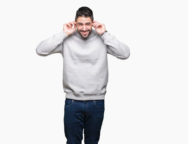 Young Handsome Man Wearing Sweatshirt Isolated Background Covering Ears Fingers — Stock Photo, Image