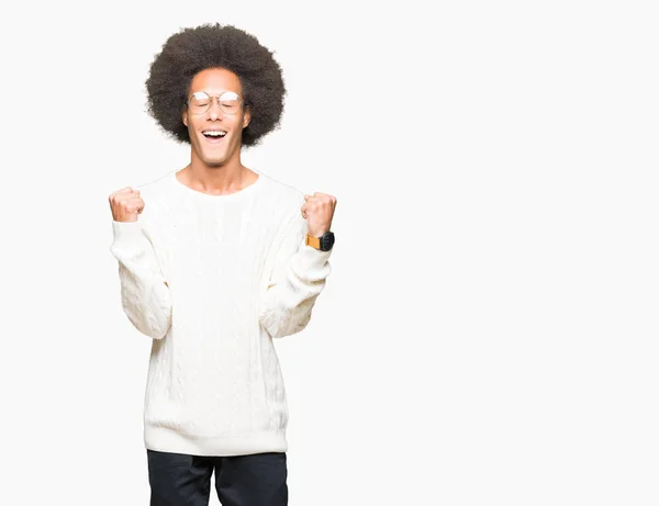 Young African American Man Afro Hair Wearing Glasses Celebrating Surprised — Stock Photo, Image