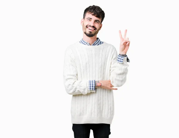 Joven Hombre Guapo Con Suéter Invierno Sobre Fondo Aislado Sonriendo —  Fotos de Stock