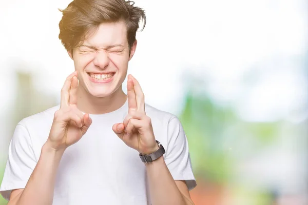 Joven Hombre Guapo Con Camiseta Blanca Casual Sobre Fondo Aislado —  Fotos de Stock