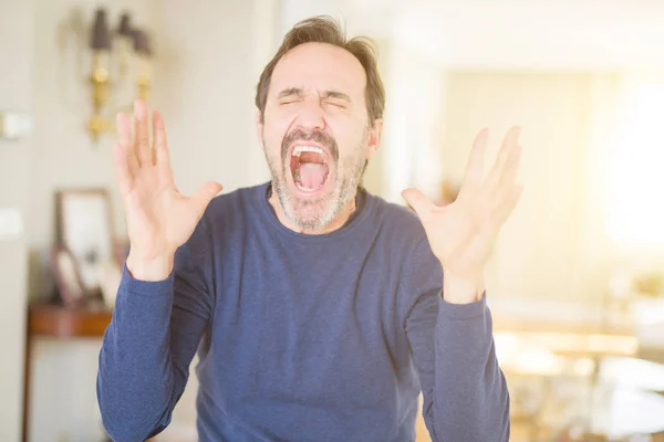 Handsome Middle Age Man Home Celebrating Mad Crazy Success Arms — Stock Photo, Image