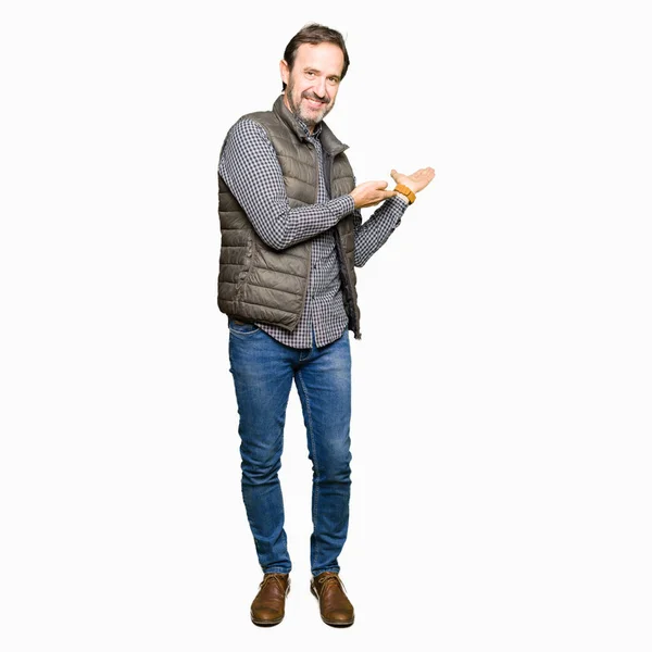 Middle Age Handsome Man Wearing Winter Vest Inviting Enter Smiling — Stock Photo, Image