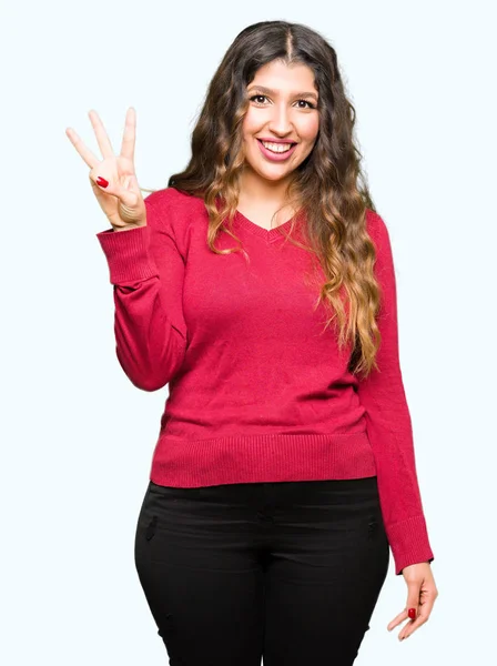 Tânăra Femeie Frumoasă Purtând Pulover Roșu Arătând Arătând Degetele Numărul — Fotografie, imagine de stoc