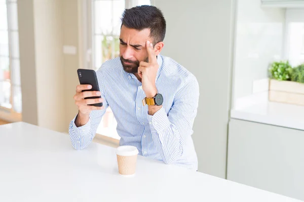 Handsome Hispanic Business Man Drinking Coffee Using Smartphone Serious Face — Stock Photo, Image