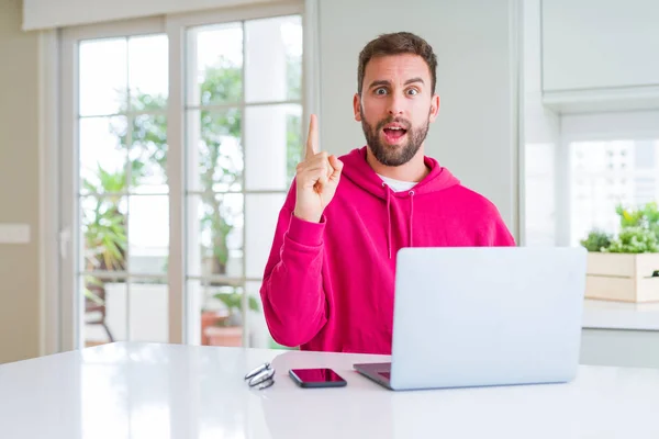 Handsome Man Working Using Computer Laptop Pointing Finger Successful Idea — Stock Photo, Image