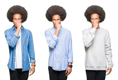 Beyaz izole arka plan üzerinde afro saç ile genç adam kolaj bir şey kokmuş ve mide bulandırıcı, dayanılmaz koku, burun parmaklarıyla nefes tutarak. Kötü koku kavramı.