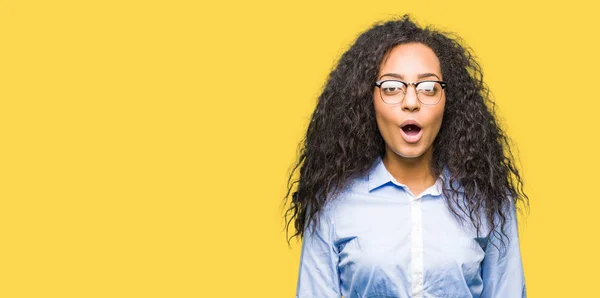 Young Beautiful Business Girl Curly Hair Wearing Glasses Afraid Shocked — Stock Photo, Image